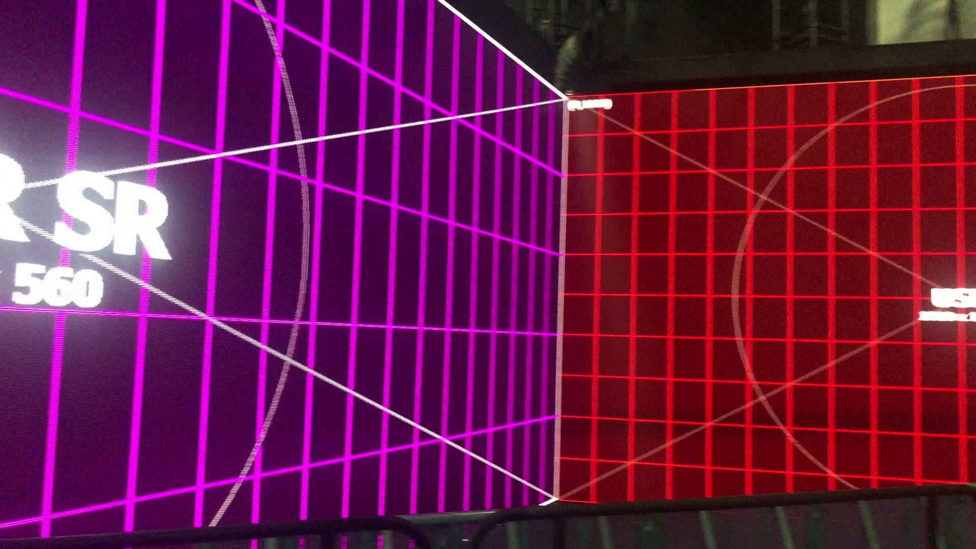 Red and green LED wall mapping surfaces with overhead fixtures
