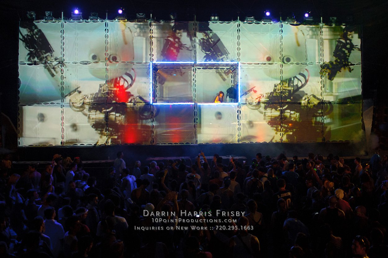 Crowd facing the Root Society Tower of Babel during a live visual set